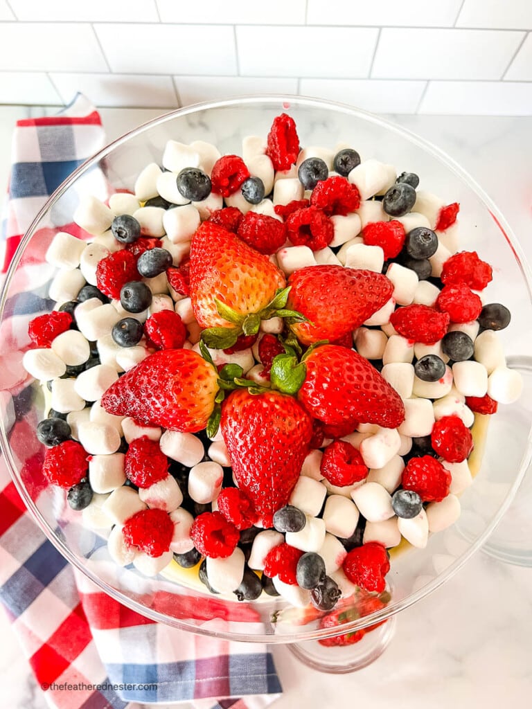 overhead: Looking down into a bowl of red white and blue cheesecake salad.