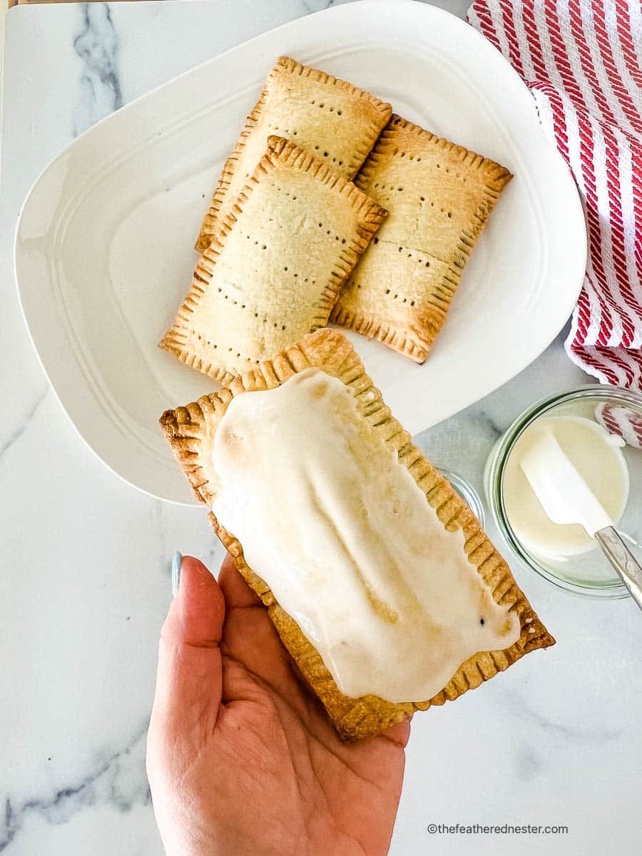 A close up of an iced toaster pastries.