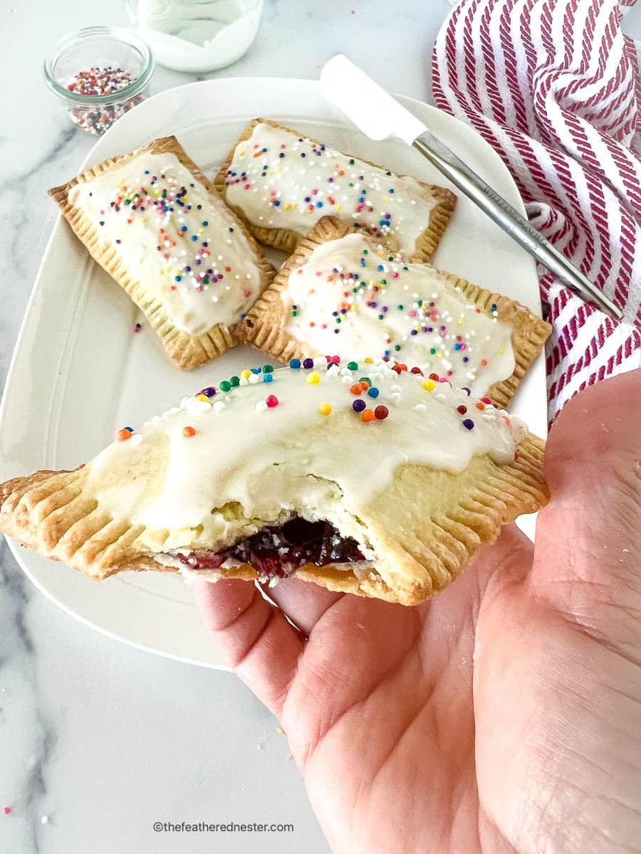 A closeup of breakfast pastries in the hand.