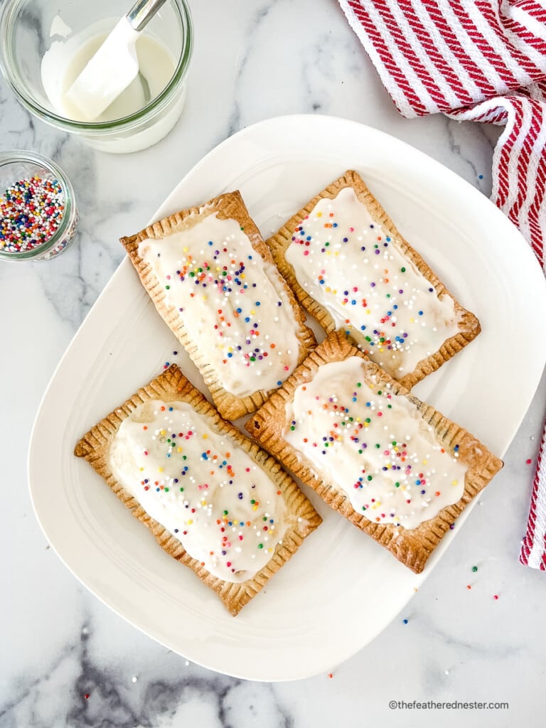 a plate of frosted homemade pop tarts ready to serve.