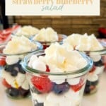 Festive looking strawberry blueberry salad with mini marshmallows for the 4th of July.
