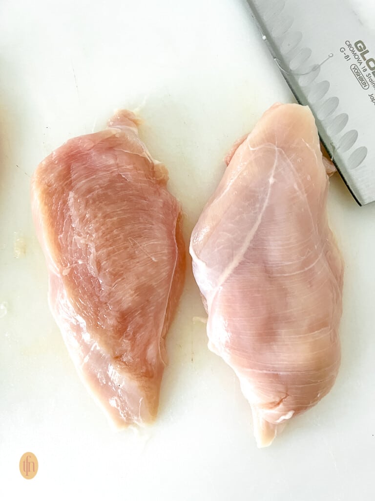 Two chicken breast cutlets.