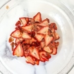 A bowl of dried strawberries.