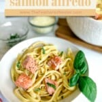 Titled graphic for salmon alfredo pasta recipe post.
