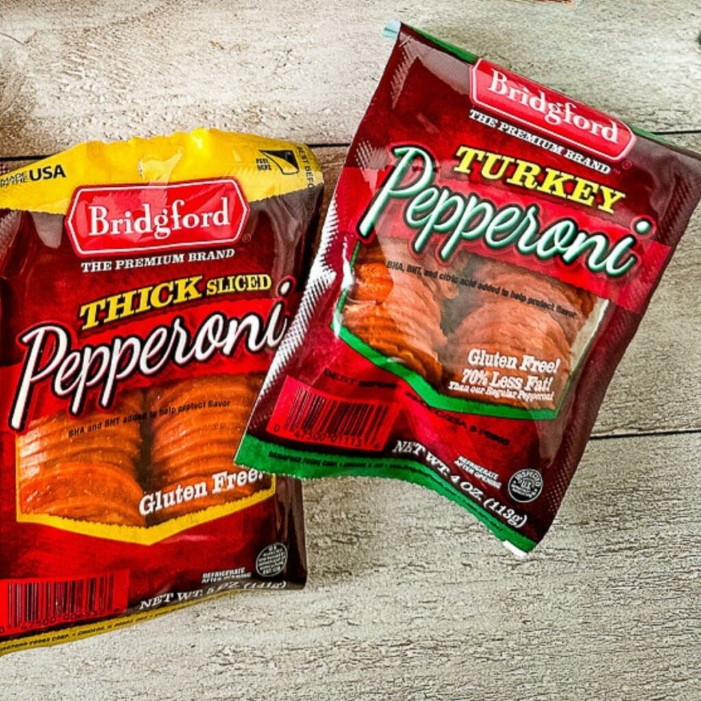 Packages of Bridgford Meats pepperoni slices and turkey pepperoni slices.