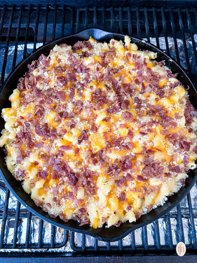 Pellet grill mac and cheese cooking in a Traeger.