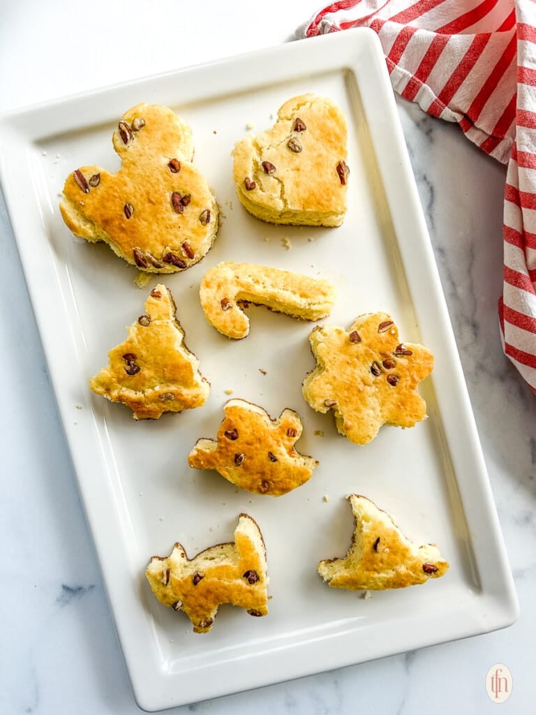 Sheet pan pancakes from a mix cut out into holiday shapes on a sheet pan.