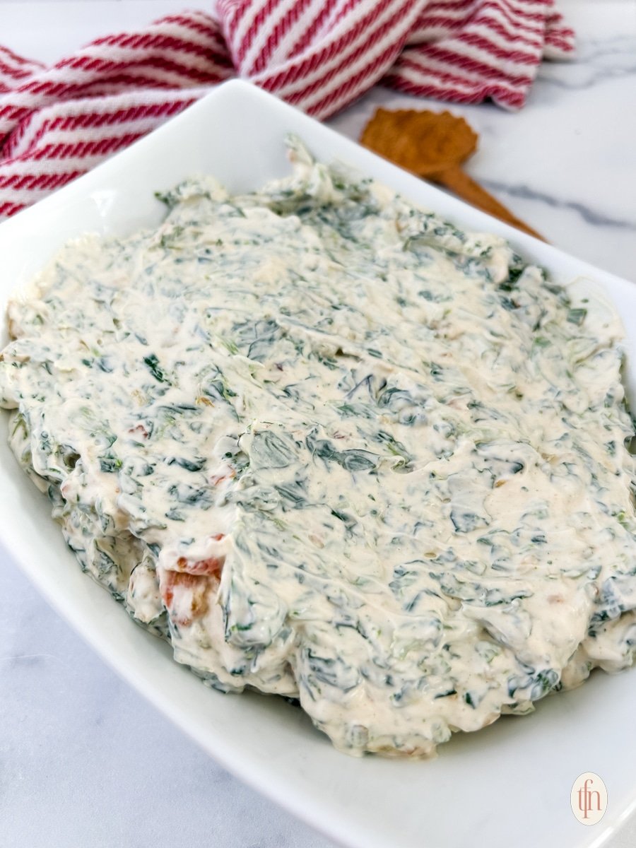 Knorr spinach dip on a serving rectangular bowl.