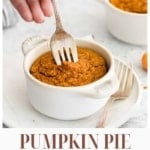 A vertical image with the title "PUMPKIN PIE baked oats" at the bottom. The main image shows a hand with a fork sinking into a portion of baked oatmeal served in a small white oven-safe bowl. The website "TheFeatheredNester.com" is at the bottom.