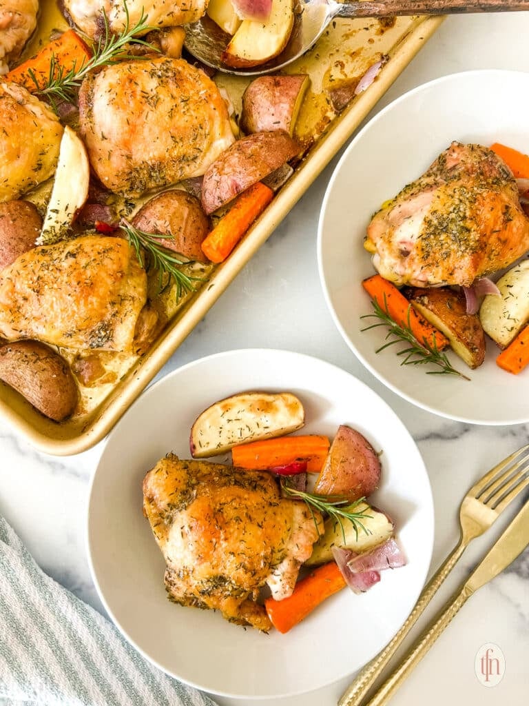 A pan of sheet pan chicken thighs next to servings of chicken thighs and vegetables.