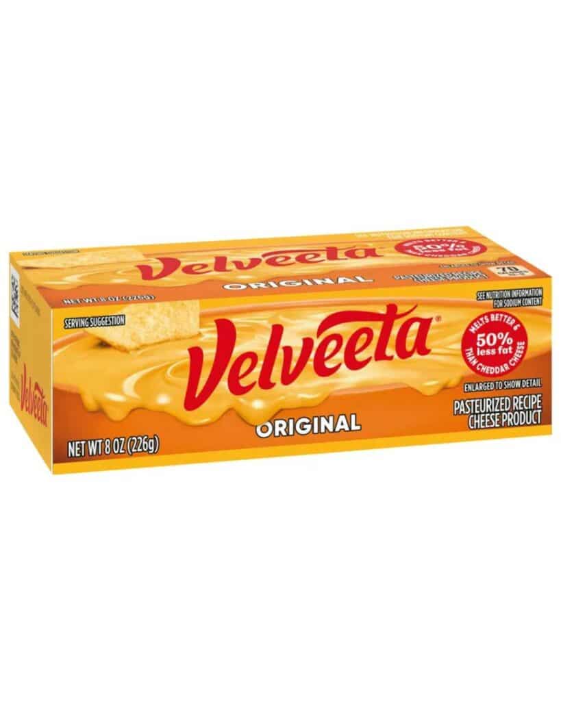 A box of Velveeta cheese on a white background.