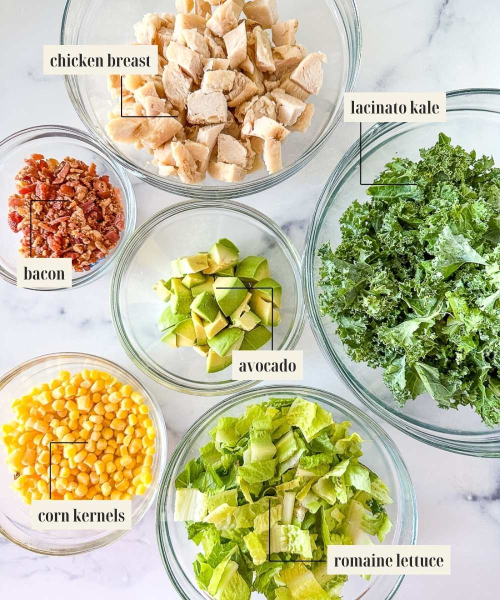Labeled ingredients for green goddess salad.