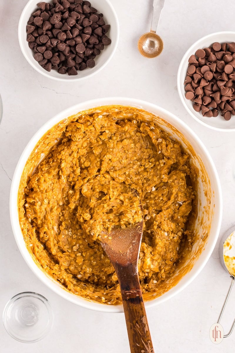 mixing cookie dough in a bowl.