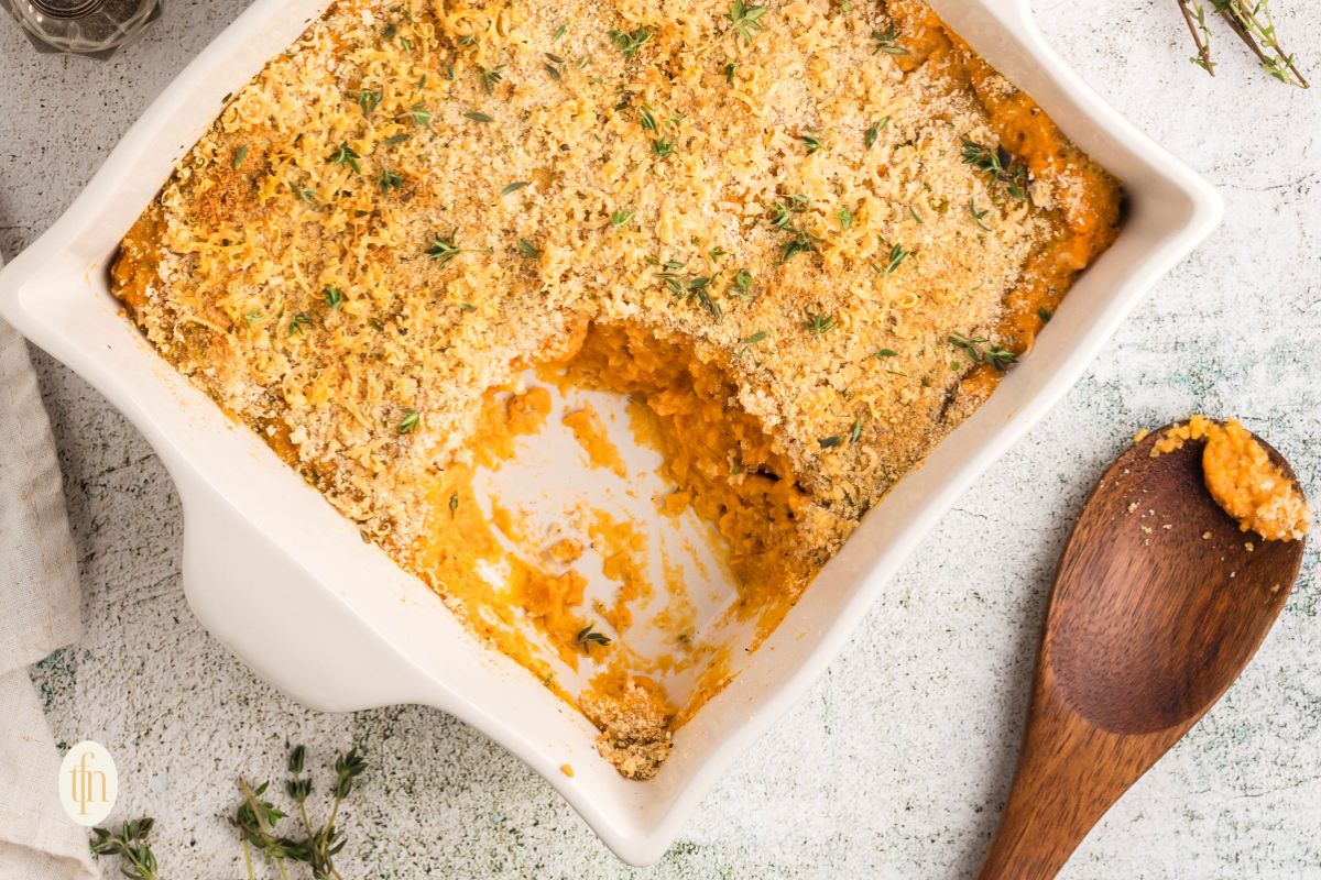 Sweet potato casserole in a white baking dish.