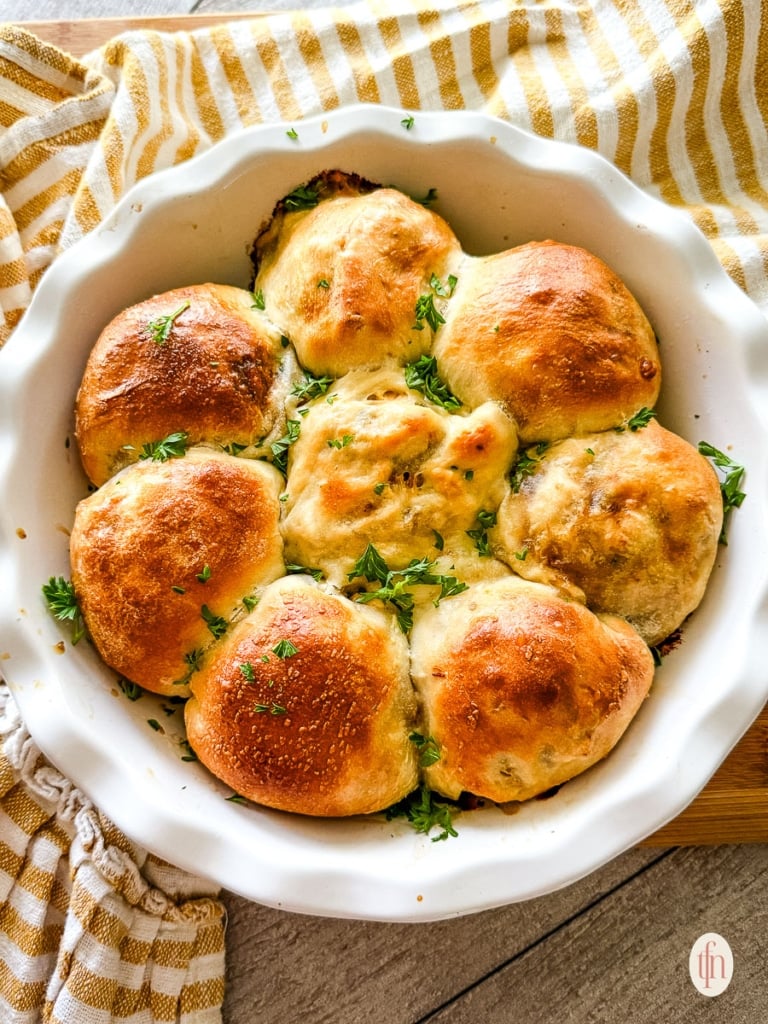 a casserole dish of baked turkey and stuffing piroshki.