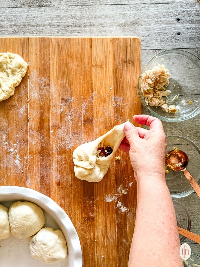 Sealing up the roll before baking.