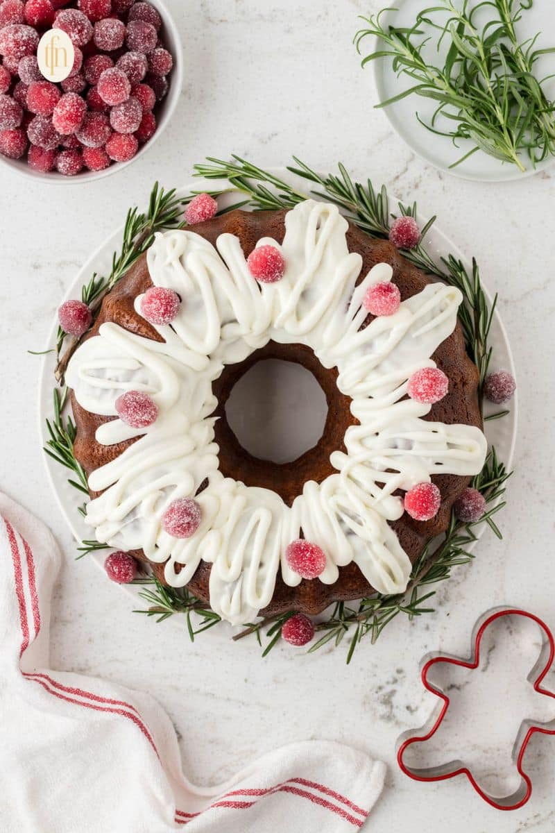 bundt gingerbread cake on a white plate.