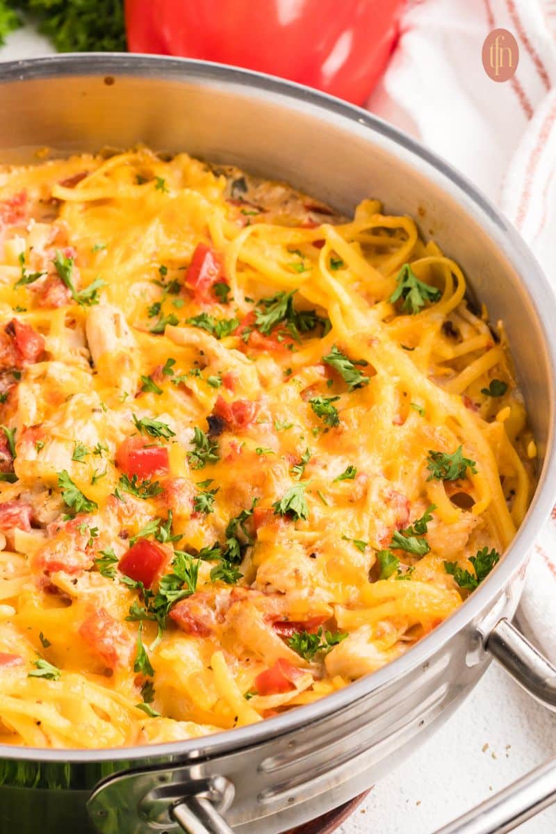 Cheese spaghetti in a pan.