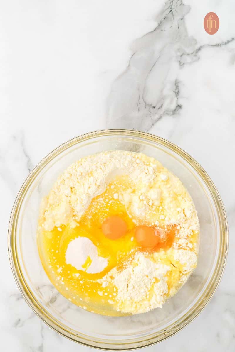 Raw ingredients in a glass mixing bowl.