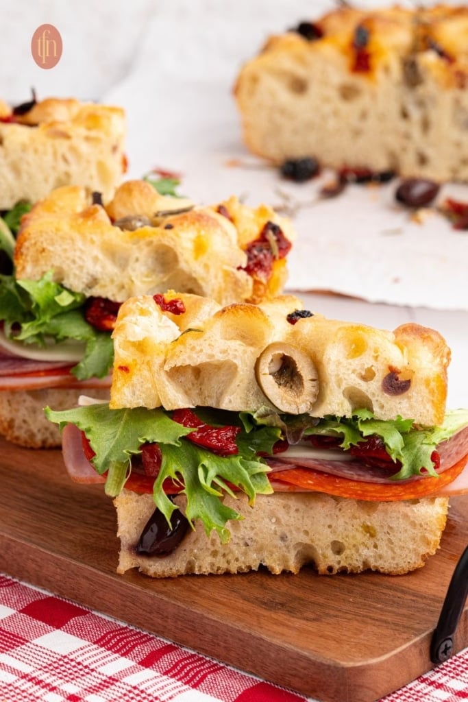 3 slices of bread on a serving board.