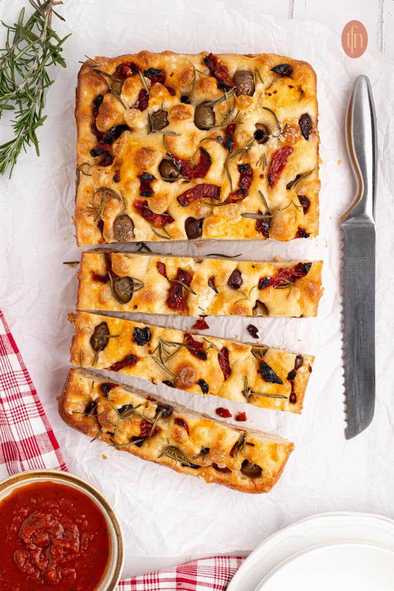 Sliced baked focaccia bread.