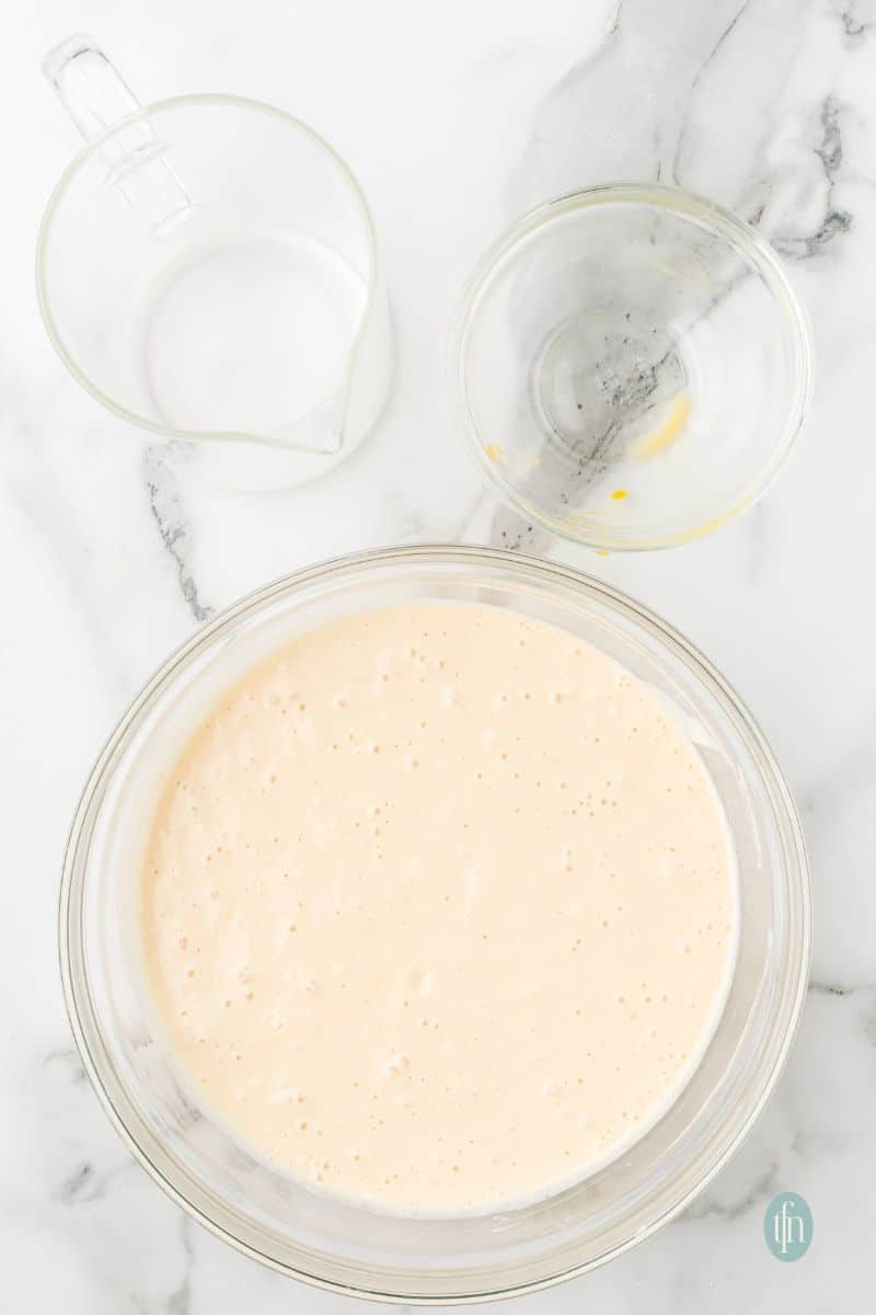 A batter mixture in a glass bowl.