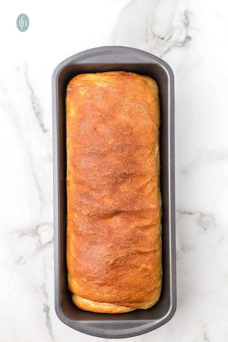 Baked loaf in a pan.