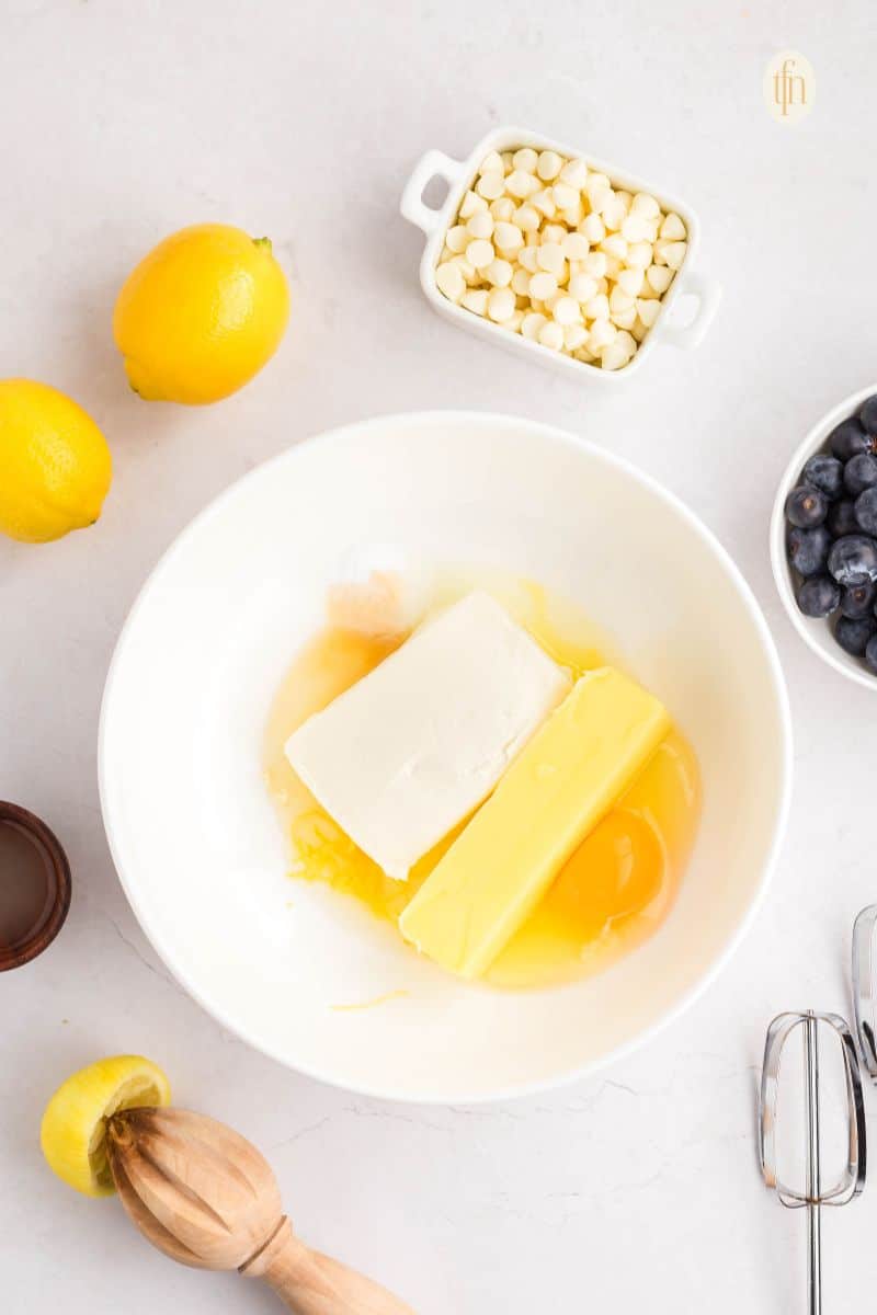 A bowl of raw ingredients for cookie recipe.