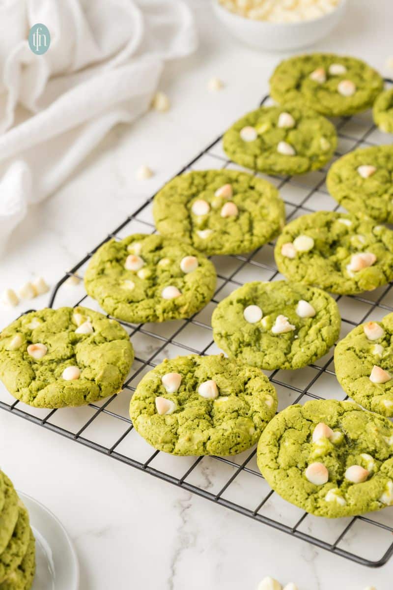 Baked cookies on a cooling rack.