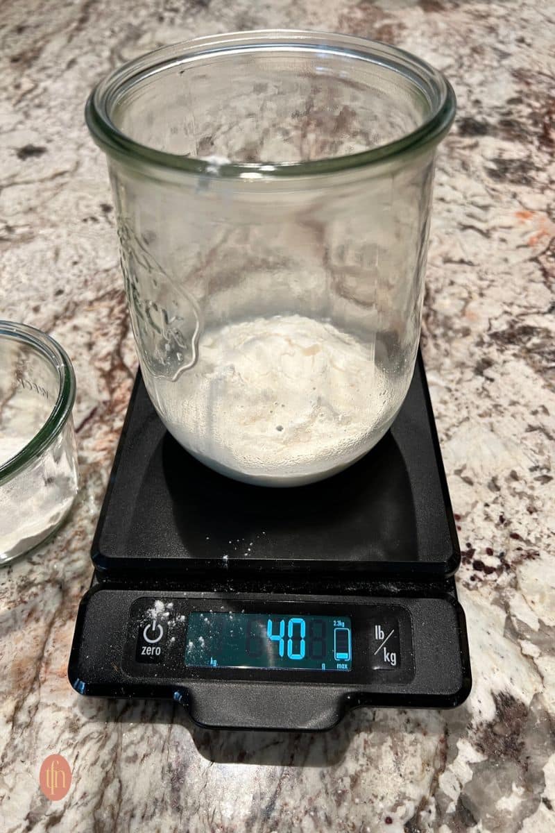 Rehydrating starter in a weck jar over a scale.