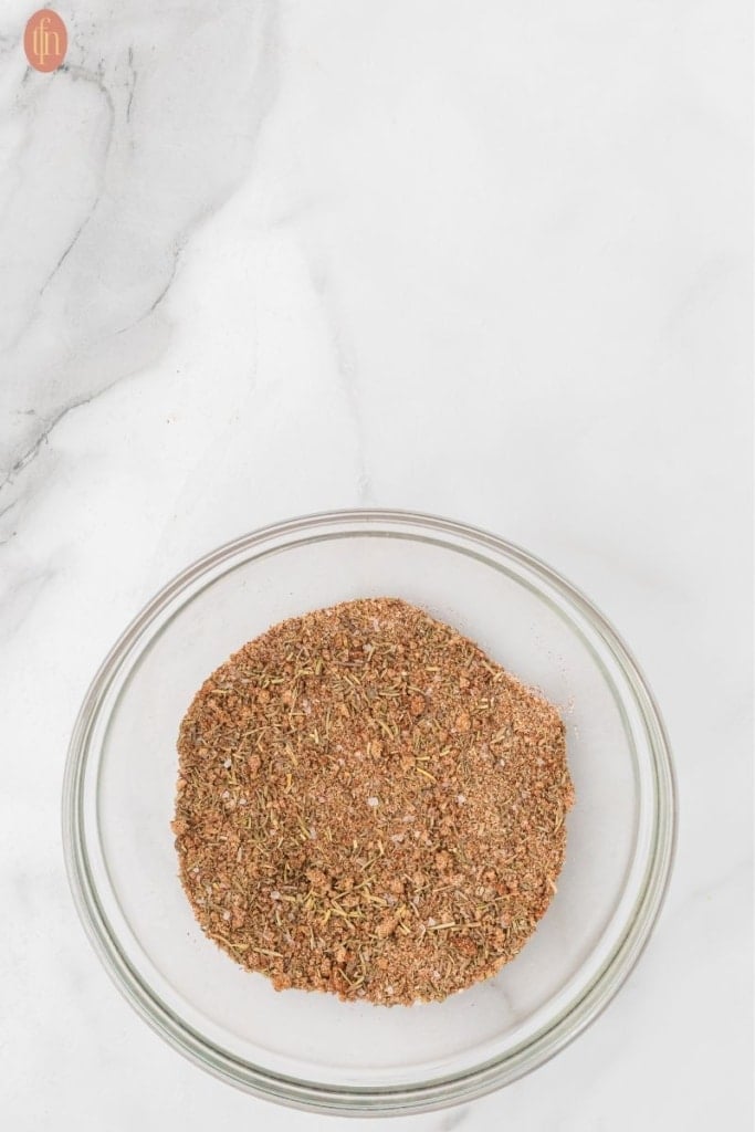 dry ingredients mixed in a bowl for Slow Cooker Country Style Ribs.