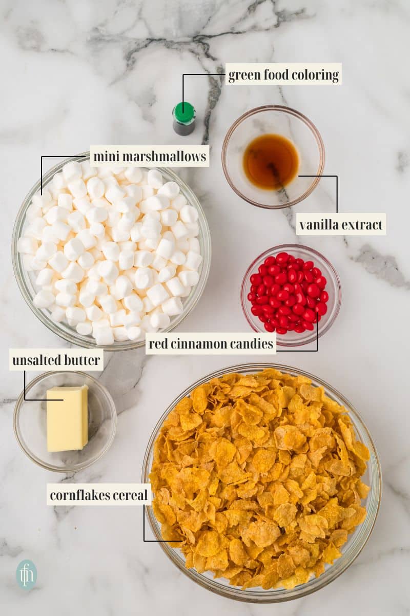 ingredients for this recipe: cornflakes cereal, red cinnamon candies, mini marshmallows, unsalted butter, vanilla extract and green food coloring.
