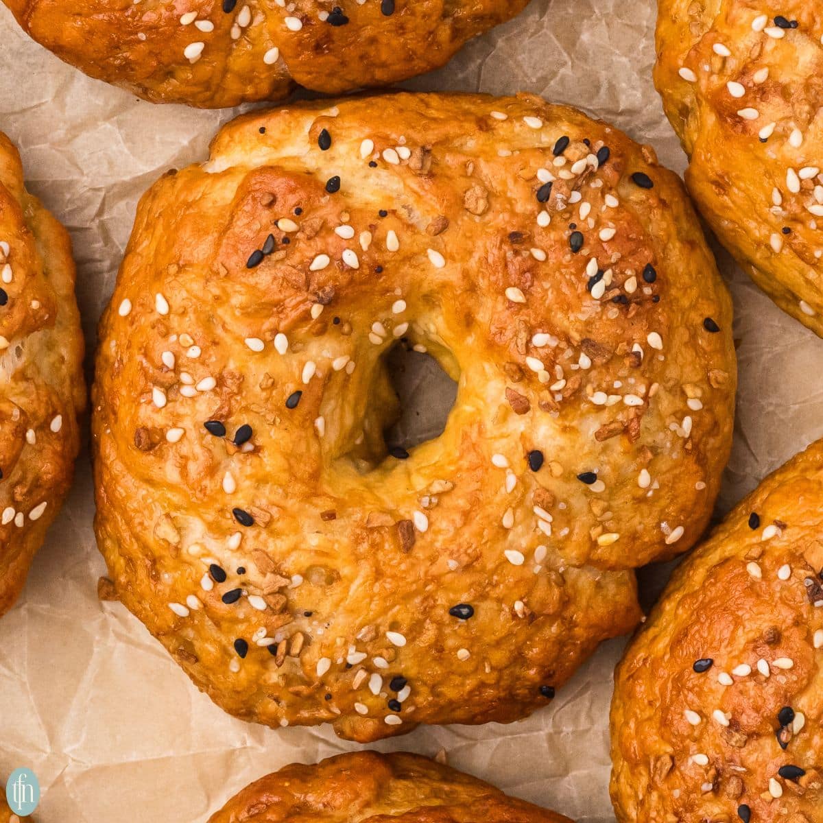 a close up image of sourdough bagel.