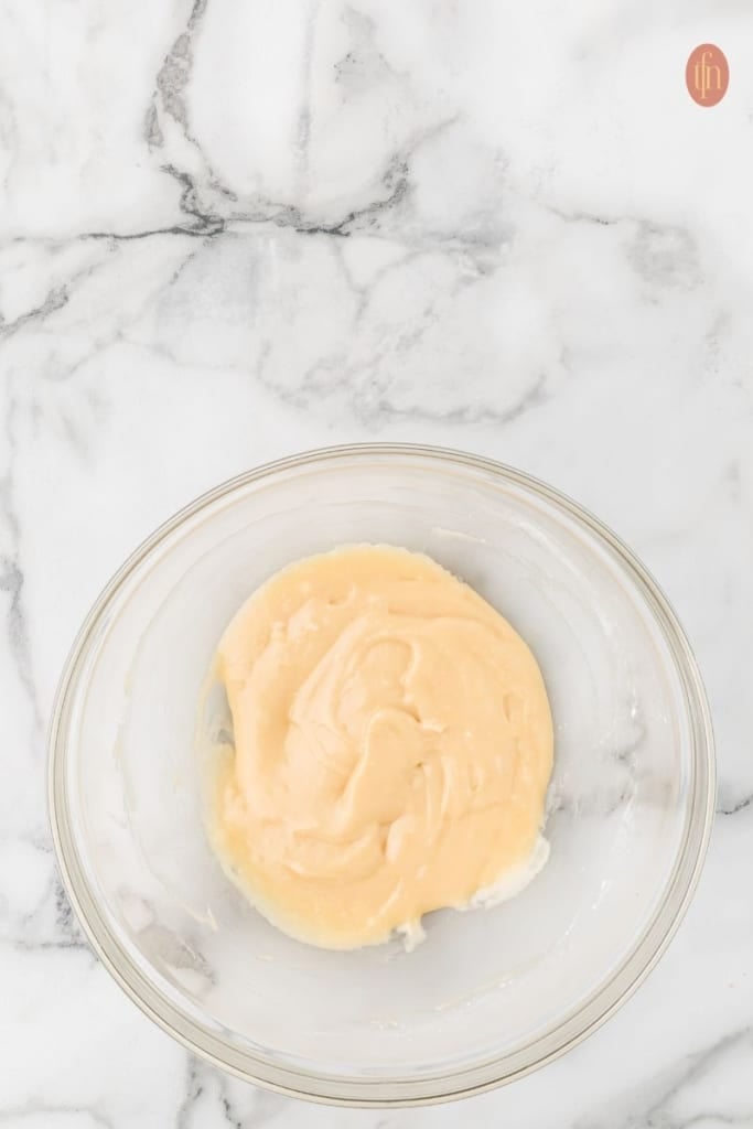 a bowl of brioche casserole ingredients.