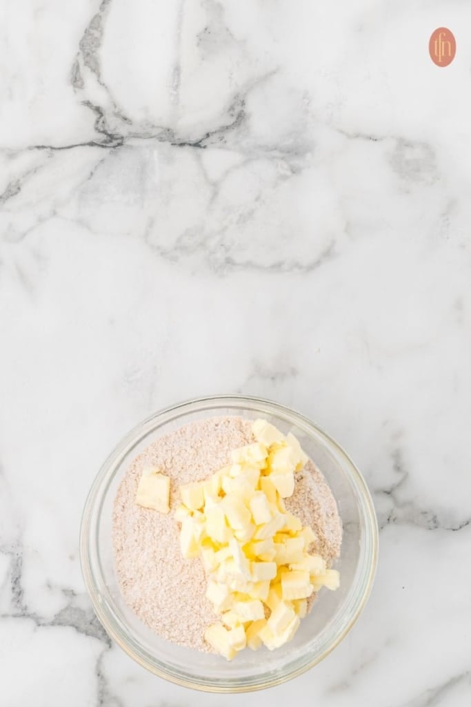 a bowl of brown sugar and butter.