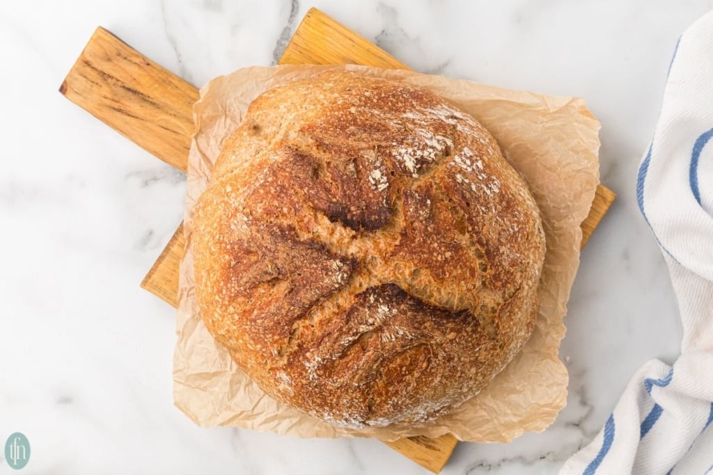 sourdough rye bread in a wooden board.