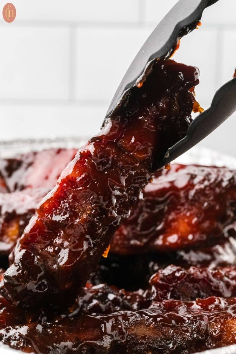 a close up shot of smoked party ribs.