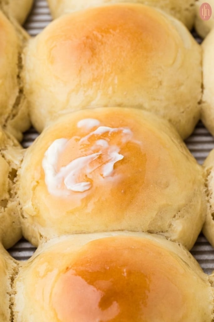 a close up shot of dinner rolls.