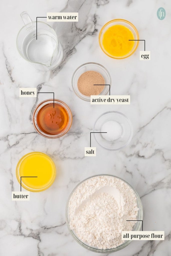 quick dinner rolls Ingredient Image: warm water, egg, honey, active dry yeast, salt, butter and all purpose flour.