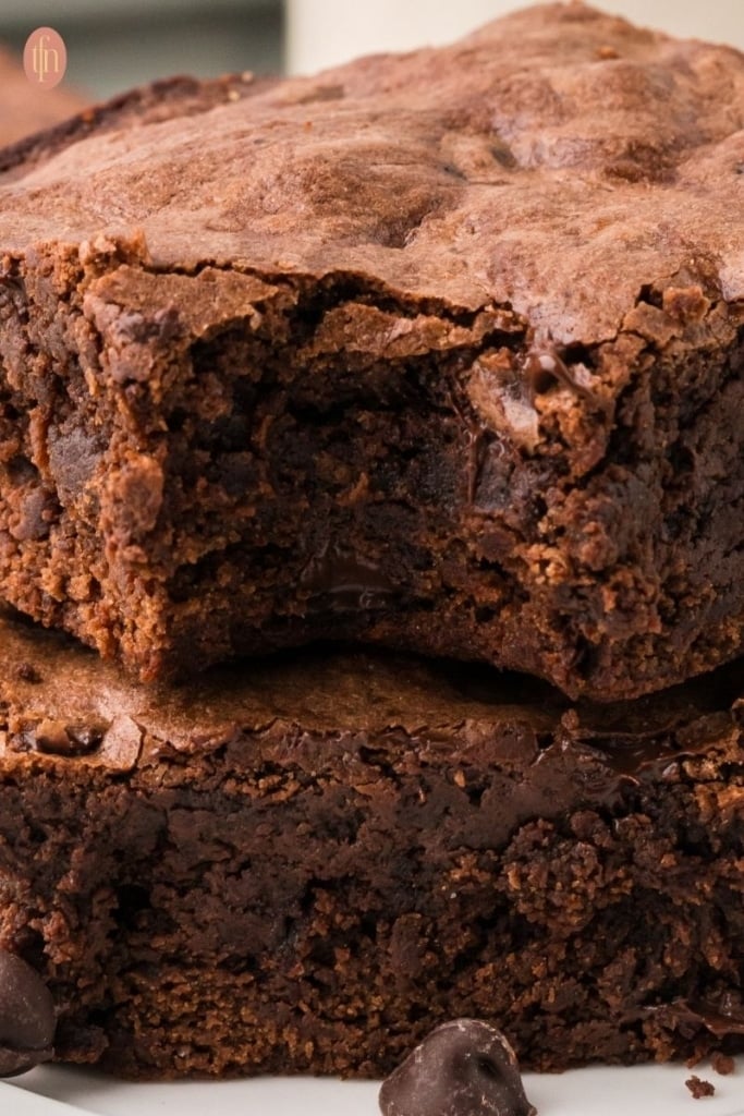 a close up shot of chocolate chip brownies.